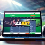 Engaging scene of Nhà cái 22BET sports betting interface on a modern laptop, surrounded by sports gear.